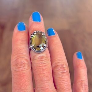 Silpada silver ring with green stone and flower detail